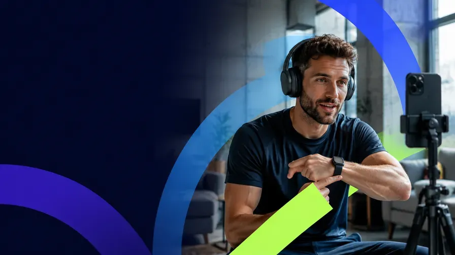 A creator with headphones and a smartwatch on camera