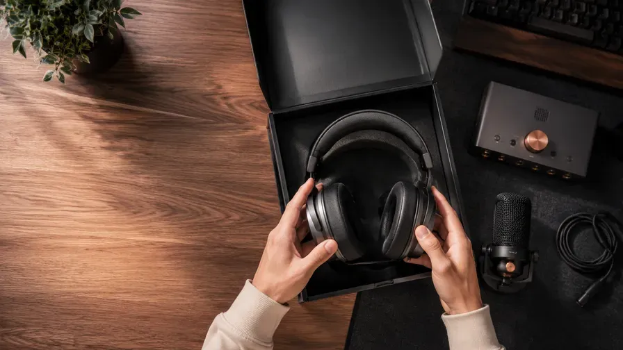 A pair of headphones being unboxed