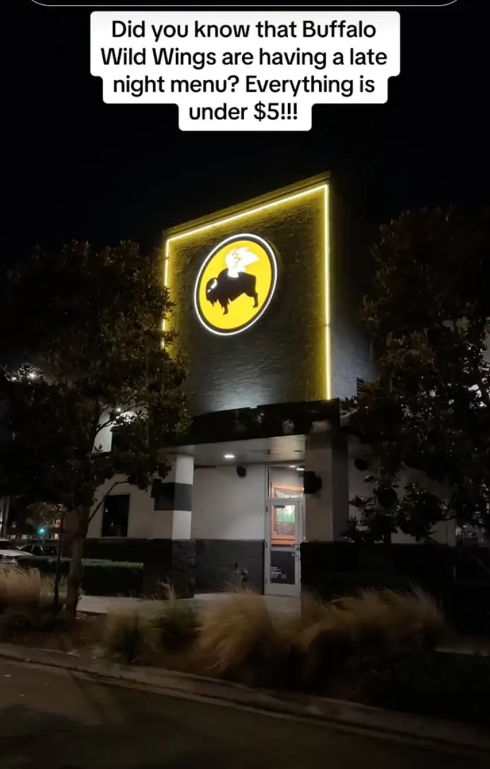 A nighttime restaurant exterior anchors the late-night menu offer to a recognizable destination.