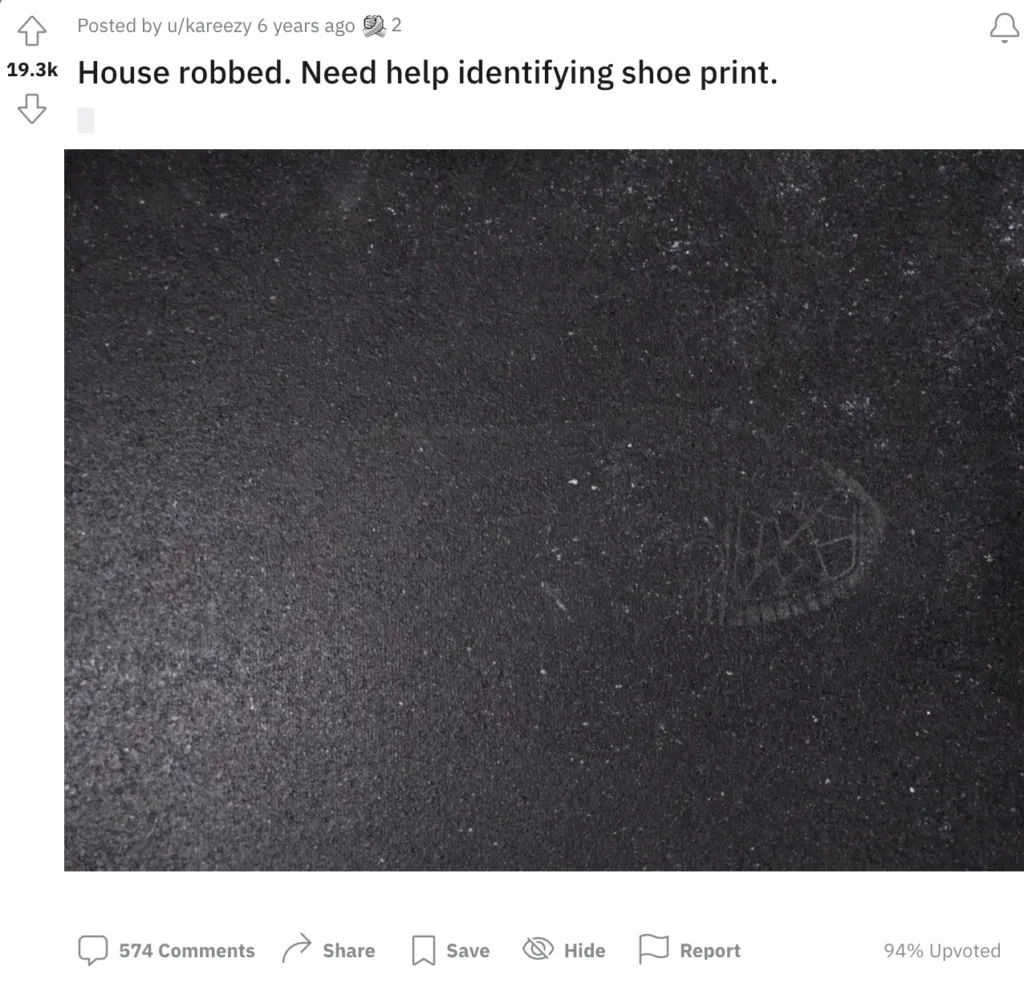 Reddit post asking help identifying a faint shoe print left on dark carpet