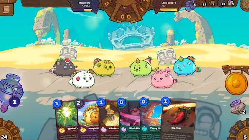 Axie Infinity battle screen with cute blob monsters facing off on a beach and a card hand below